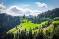 Church Cerkev Sveti Duh with mountain range KamnikÃ¢â¬âSavinja Alps Royalty Free Stock Photo